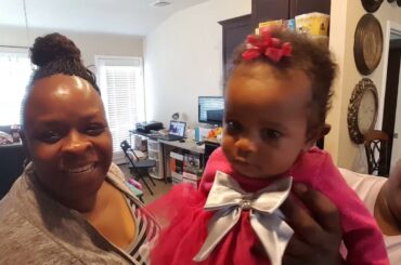 Ground beef for chili adding seasonings and talking to the family