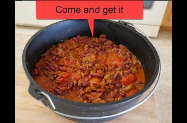 Elk Camp Chili in a Dutch oven over a campfire