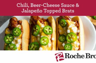 Chili, Beer Cheese Sauce and Jalapeno Topped Brats