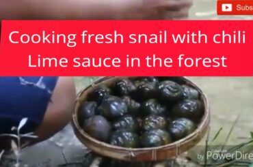 Cooking fresh grilled snail with chili lime sauce in forest ( Rapsa!!! )