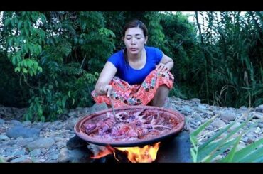 Food in wild - fried squid with hot spicy chili very delicious