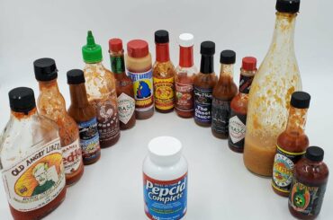 Hot sauce lineup currently in our refrigerator at work. Ranked in hotness from left to right.