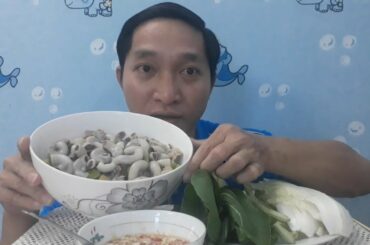 Pig intestines shaking a super spicy chili sauce.