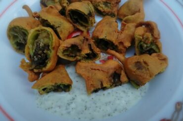 Stuffed Green chili recipe || Bhari hoi Mirch recipe || Cooking with us