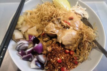 Khao Soi. There was more soup than appears. Used Lobo Khao Soi seasoning and fried egg noodles to get the crispy noodles.