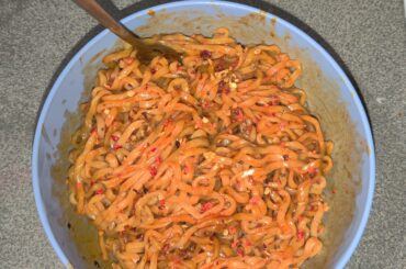 Samyang 2x spicy noodles with flatiron co sweet heat mixed in and "I can't feel my face" on top