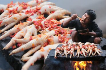 Primitive Food Cooking Recipe Food Grill Chicken Leg With Chili Spicy On Hot Rock