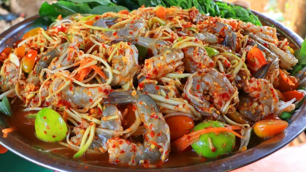 Tasty shrimp salad with papaya and chili recipe Eating spicy Papaya