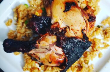 smoked chicken with handcrafted gochujang paste on a bed of homemade vegetable fried rice