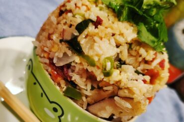 Basil fried rice with bacon, thai peppers and some sliced dried coconut for a sweet/savory deal and a good kick to it