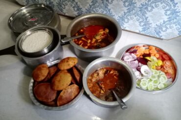 Homemade spicy chicken curry with Puri (fried flat bread) and steamed Rice - No one could not wait long enough for a more artistic picture