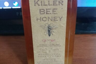 Carolina reaper honey! It's subtle, but the heat builds up really nicely