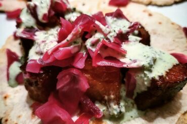 chipotle pork belly burnt end tacos + creamy poblano cilantro sauce + quick pickled cabbage and shallot + gluten free corn tortillas