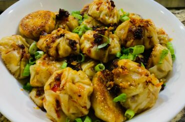 Girlfriend made some chili oil momos with ghost pepper flakes