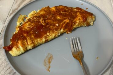 Jalapeño and Mozzarella omelet with LOTS of Renfro’s on top.