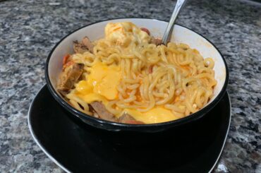 Samyang 2x Spicy with smoked brisket, cheese, and a poached egg