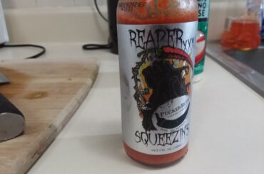 Reaper squeezin's an original Carolina Reaper hot sauce