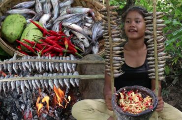 Yummy Fish grilled tasty vs Green mango hit with hot chili for eating delicious in forest