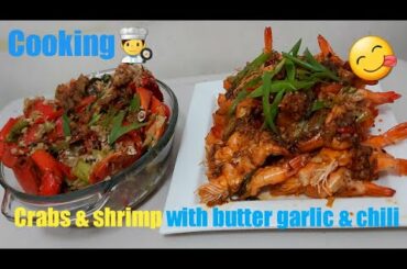 Cooking Crabs & Shrimp with butter,garlic & chili