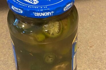Just finished the second step in making my first ever batch of pickled jalapeños and Habaneros. Bout to put them in the fridge