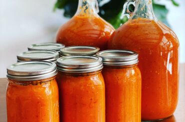 Bigggg Batch of Hot Sauce. Can anyone recommend any bottling methods for a non cooked sauce? I’ve tried pressure sealing w a light boil in the past but it affected the flavor profile too drastically. PH level of 3.6 👌