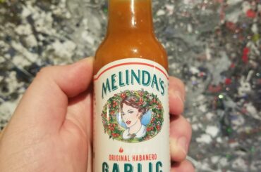 I like grabbing rando sauces from time to time. Not too hot, but I'm a slut for garlic. Bright and vinegar based.