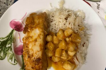 Scallop curry, masala halibut with naga pickle, and rice.