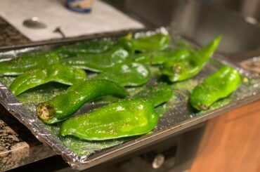 We get Hatch chilies pretty much once a year here in VA. So when they came back out, I made sure to capitalize. Here’s 12 about to go in the oven for roasting.