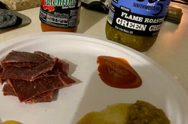 My late night snack, beef jerky dipped in Valentina and salsa