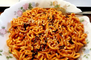 Fire noodles with a slice of cheese mixed in. Simple but yummy!