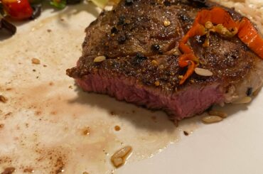 Ribeye with 4 pepper powder dry rub garnished with a couple slices scotch bonnet.