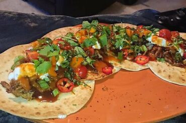 Shredded Pork tacos with an 'Apple Habanero' BBQ sauce.
