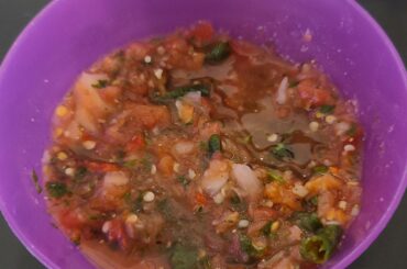 My homemade salsa: fresh tomatoes, cilantro, onion, salt, pepper, garlic, long green chiles, habanero, and scorpion peppers.