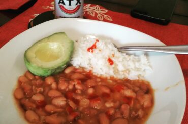 Spicy pinto beans and rice with ATX Smoked Habanero hot sauce