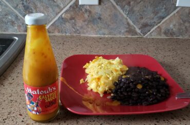 Lumberjack breakfast of eggs, beans and spicy Calypso sauce. This stuff is delicious