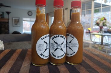 Every year, I grow my own peppers and make a big batch of hot sauce for family and friends for Christmas. My label design is amateur, but the sauce is legit! Sweet and savory with a slow burn.