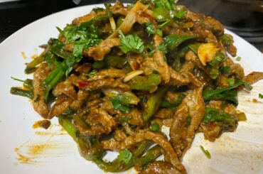 Doesn’t look spicy, but packs Sichuan peppercorn, red chili, sliced green Chili’s and a heavy dose of cumin for a mouth watering heat