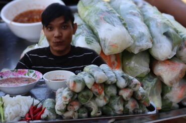 Eating Spring Rolls with chili sauce- delicious food recipe