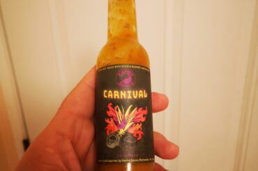 This is one of the tastiest hot sauces I've ever tried. Slightly sweet, with some nice hints of ginger, and enough kick to make me panic a little bit when I put too much on. Mainly scotch bonnet and moruga scorpion peppers. Give it a try! You won't be dissapointed!