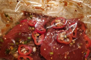 Marinating some spicy tuna steaks!