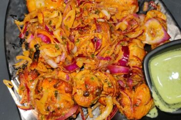 I ATE achaari chicken tikka. Basically tandoori chicken with fried onions and an overall pickle flavor. Spicy with a bit of pickle like taste