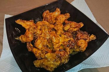 Extra Hot Banshee Buffalo Wings with cheese and extra Reaper sauce