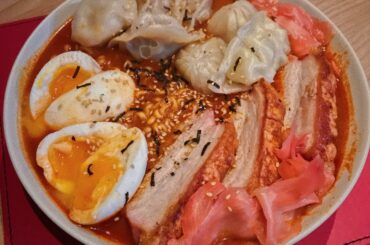 2 x Spicy ramen with extra samyang hot sauce, miso, soft boiled eggs, crispy skin pork, an assortment of gyozas and 2 soft boiled eggs.