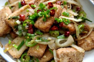 Salt and pepper tofu! With lots and lots of hot korean chillies.