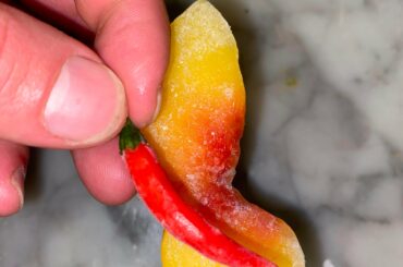 frozen peach + thai red chili is a great snack