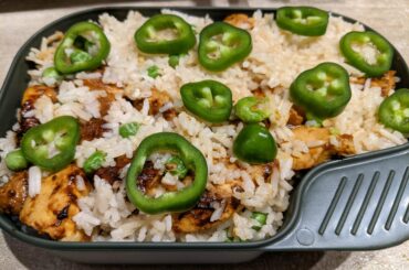 Dudes at work: How do you eat that fresh jalapeno, it's too hot?! Me: Literally soaked the chicken in Trinidad Moruga Scorpion sauce + sriracha and adobo in rice.