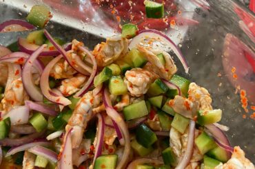 My dad’s shrimp ceviche with a ton of Thai chilis blended into the lime juice.