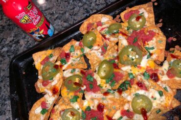 Paqui ghost pepper nachos with habanero cheese, homemade pickled jalapenos, and samyang 2x spicy sauce