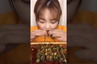 Girl Eating Food With Chili Sauce