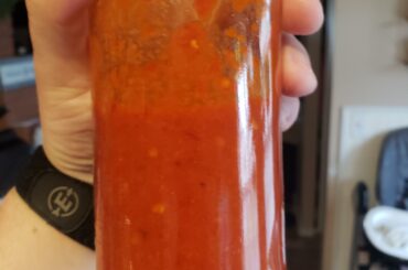 A hotsauce i made with the remnants of last years peppers. Thats 20 scorpions, 6 Fresno's, and 4 long horns. Great taste but packs a punch